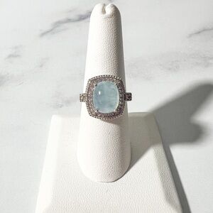 11x9mm Cushion Aquamarine With 0.40ctw White Zircon Rhodium Over Silver Ring